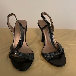 Classic black snakeskin stiletto